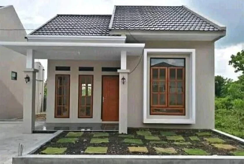 Mẫu nhà một tầng mái ngói xám với sân vườn và cửa gỗ lớn